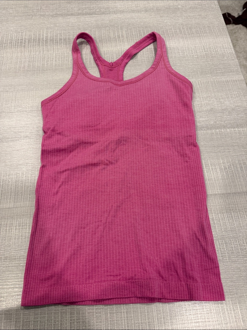 Lululemon Ebb to Street pink tank. Size 4. Great condition.